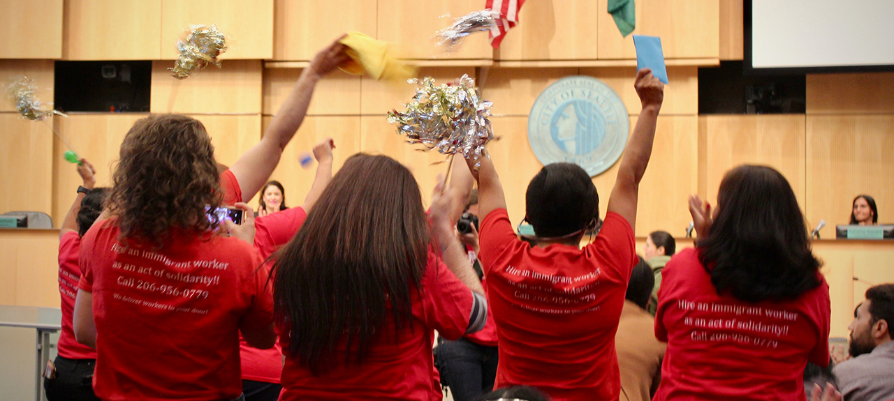 Organizers celebrate at the city council