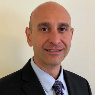 Portrait photograph of Alex Amitrano, Seattle Foundation IT manager.