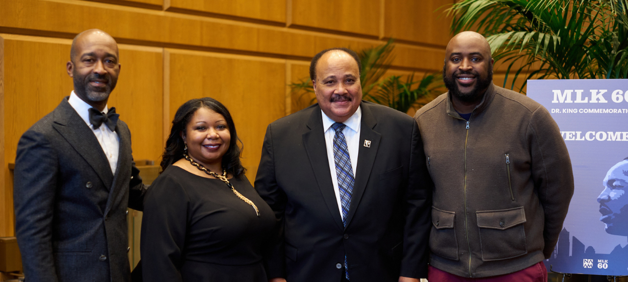 Seattle Foundation staff members Cedric Davis (L) and Jonathan Cunningham (R) pose with LaNesha DeBardelaben of the Northwest African American Museum and Martin Luther King III to celebrate the 60th anniversary of Dr. Martin Luther King Jr’s visit to Seattle.