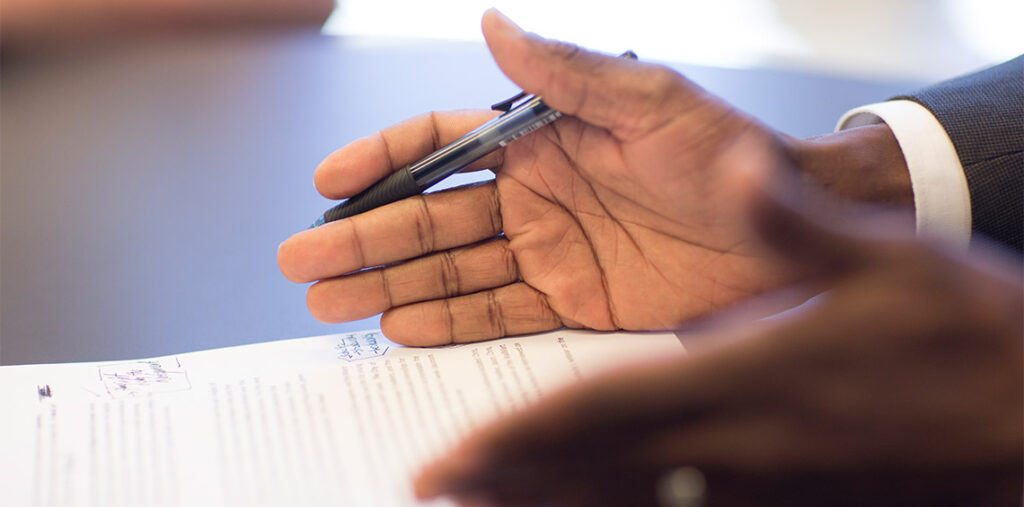 Michael Brown's hands explaining in a meeting