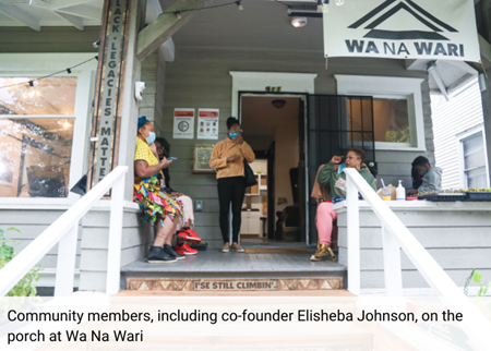 Community members including co-founder Elisheba Johnson on the porch at Wa Na Wari